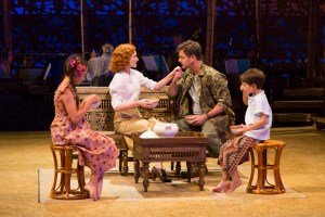 Louisa Darr (Ngana), Erin Mackey (Ensign Nellie Forbush), Edward Staudenmayer (Emile de Becque) and Sander L. Huynh-Weiss (Jerome) in the Guthrie Theater’s production of South Pacific. Photo by T. Charles Erickson